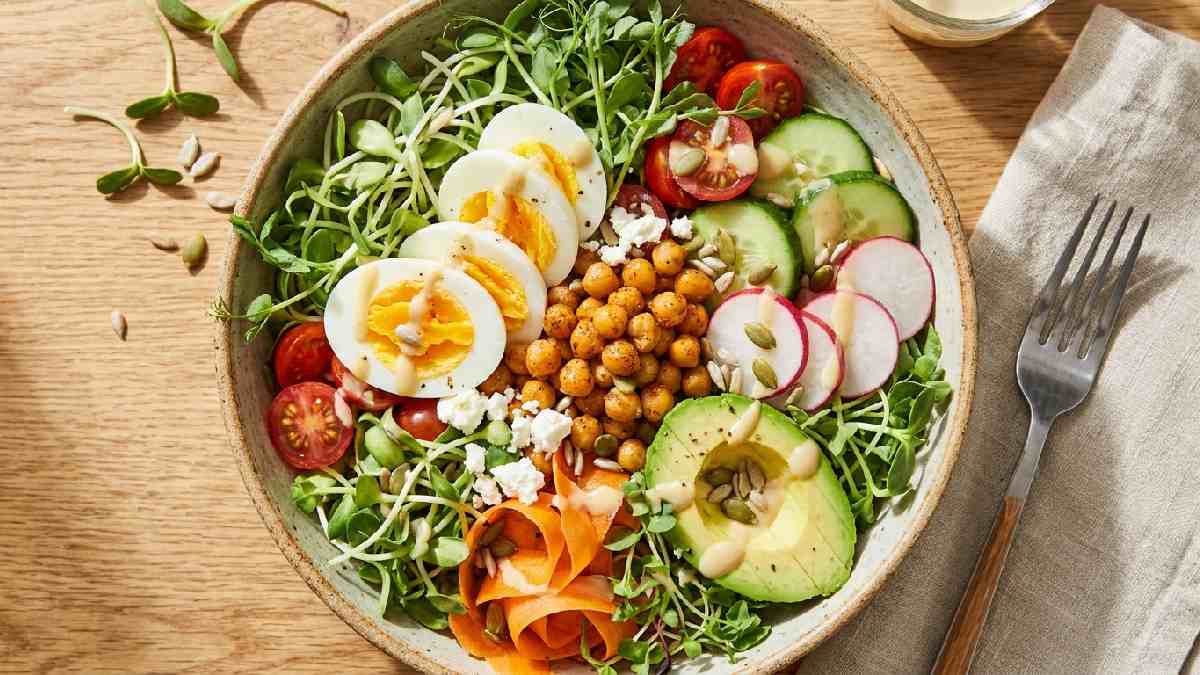 “High-protein microgreen salad with eggs and chickpeas.”